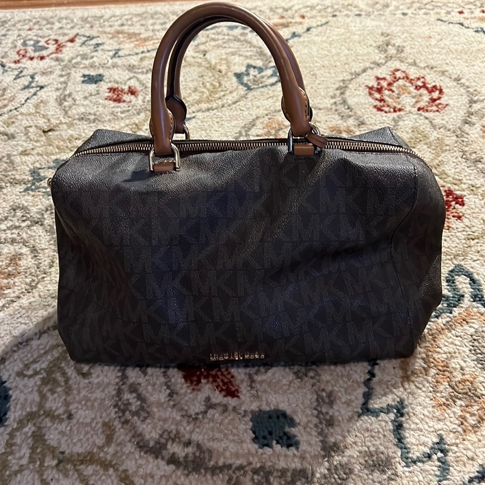 Michael Kors purse. Brown with hand straps.